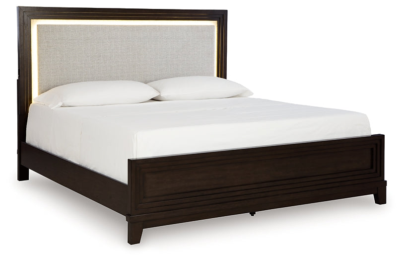 Neymorton California King Upholstered Panel Bed with Mirrored Dresser, Chest and Nightstand